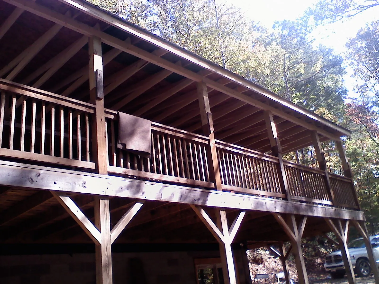 Timber framing under a new elevated porch and deck — Roof Leak Repair in Melcher Dallas by Roofing Brothers